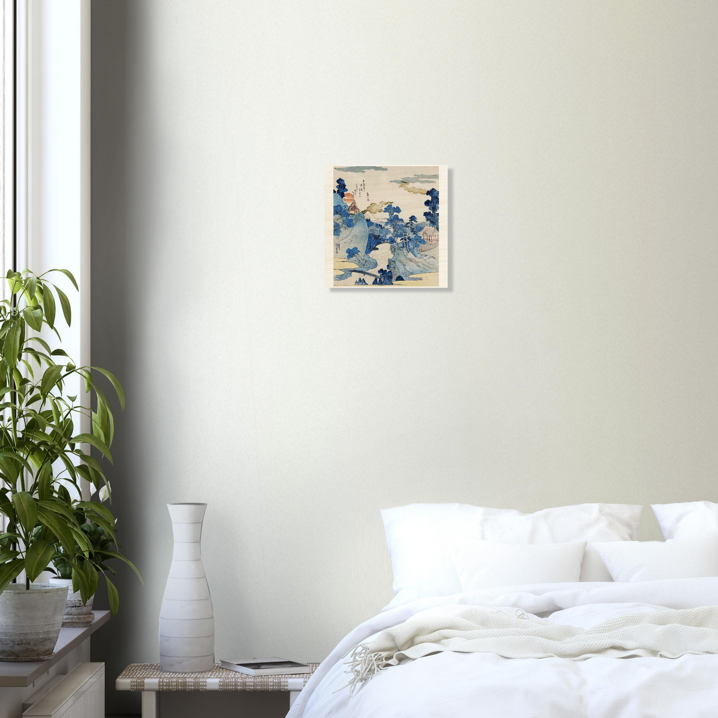 Modern bedroom with a bed, plant, and abstract painting on the wall.