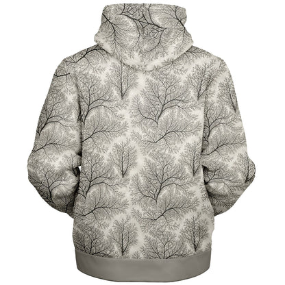 A hooded sweatshirt shown from the back, featuring an all-over black line-art tree branch pattern on a light gray to off-white base. The hoodie has a solid gray ribbed hem and cuffs, and is photographed on a plain white background.