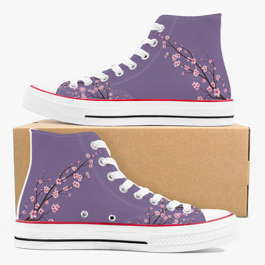Purple high-top sneakers with floral design on a cardboard box
