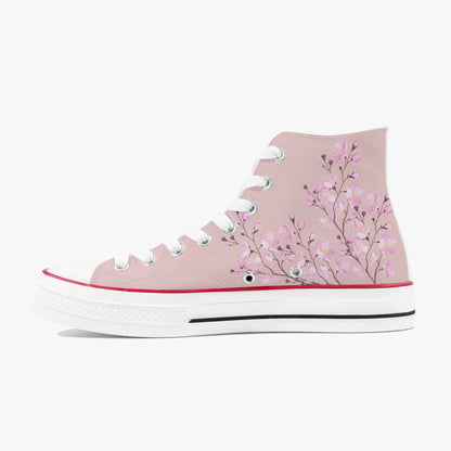 Pink high-top sneaker with floral design on a white background