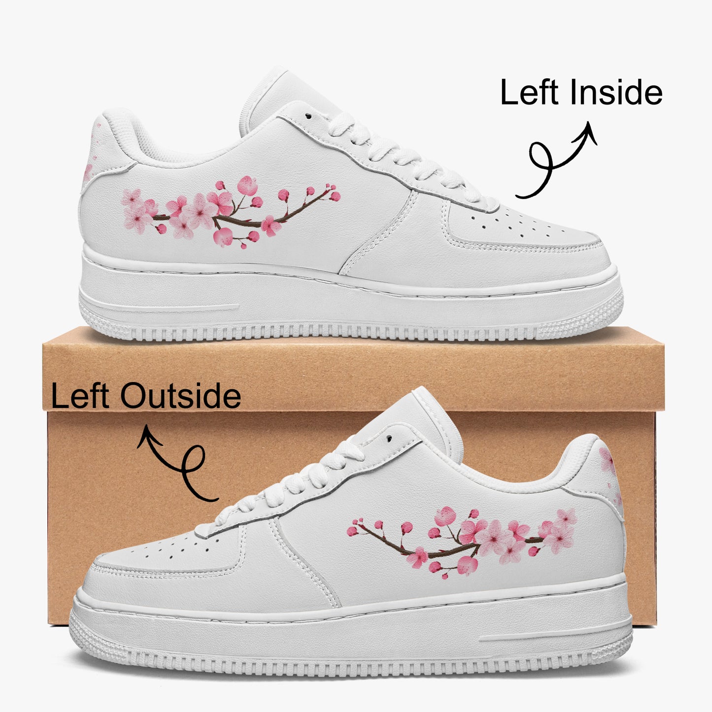 White sneakers with cherry blossom design on a cardboard box