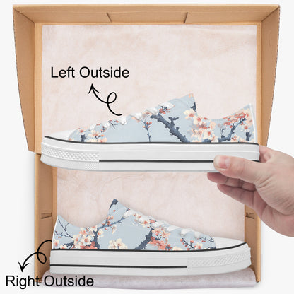 Floral-patterned sneakers being held above an open box with 'Left Outside' and 'Right Outside' labels.