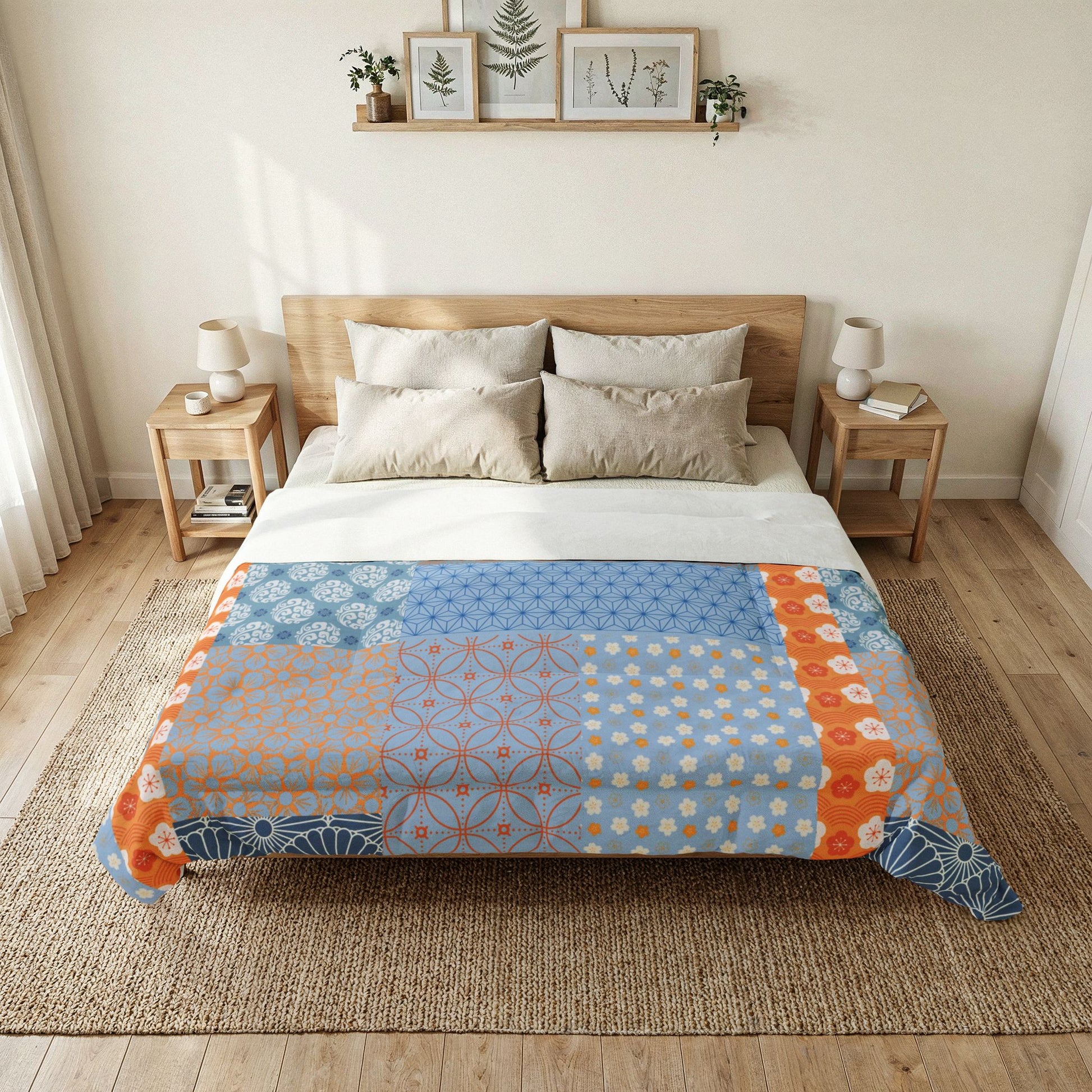 Bedroom with a bed featuring a colorful quilt and two nightstands with lamps. Heritage Cotton