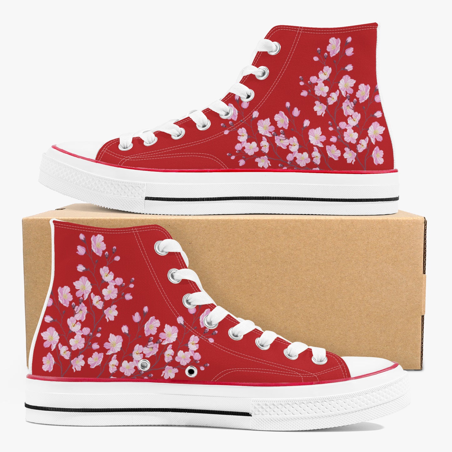Red high-top sneakers with floral pattern on a cardboard box