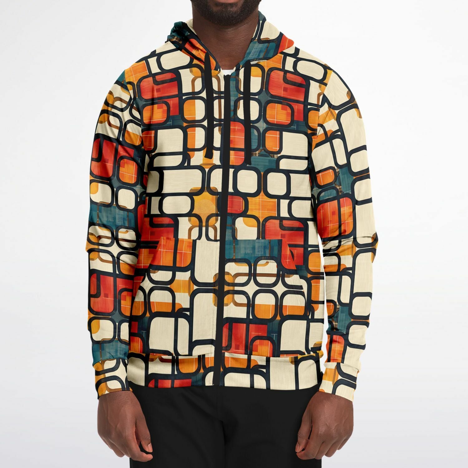 Person wearing a colorful geometric patterned jacket on a white background