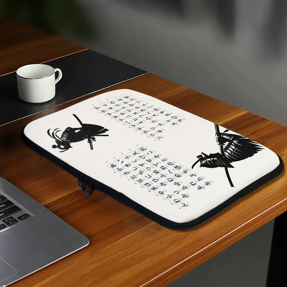 Desk setup with a laptop, mug, and decorative mat featuring black insect illustrations and text.