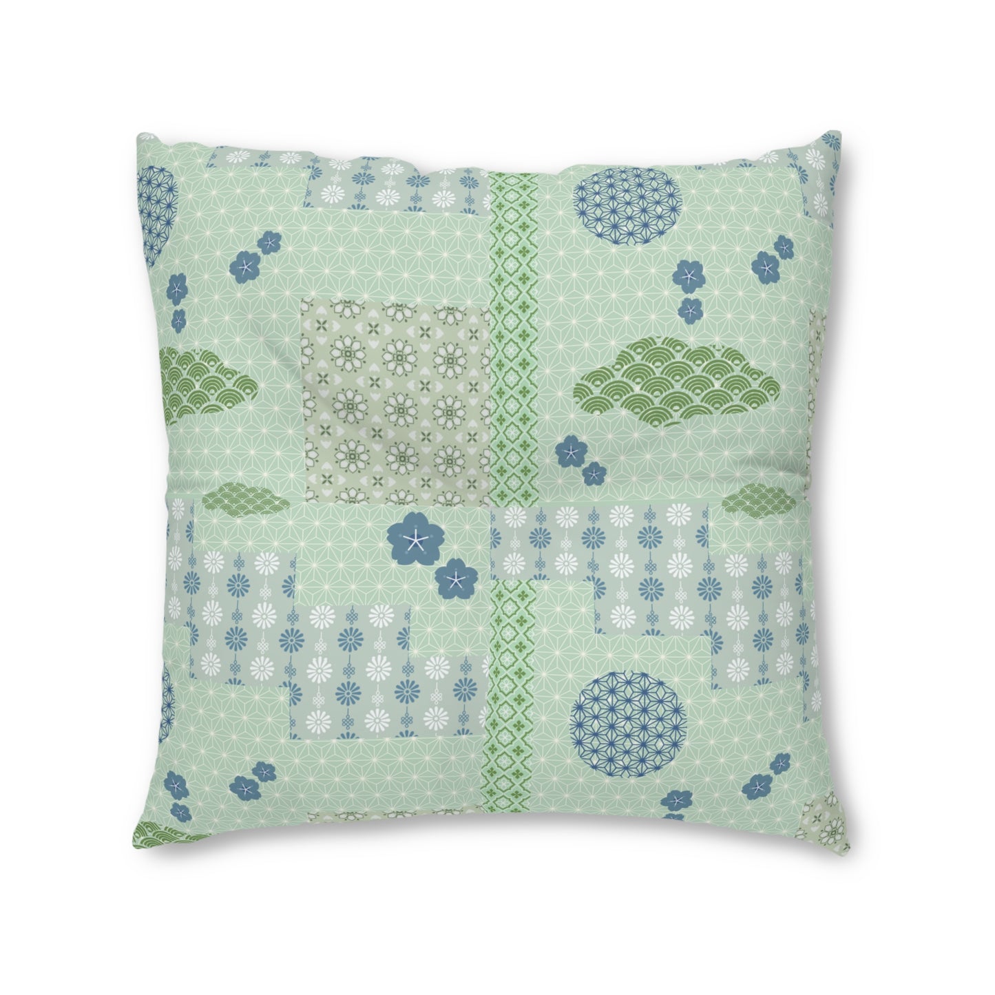 A square decorative throw pillow featuring a light mint green patchwork design with various Japanese-inspired patterns, including floral motifs, wave designs, and geometric borders in shades of green, blue, and white.
