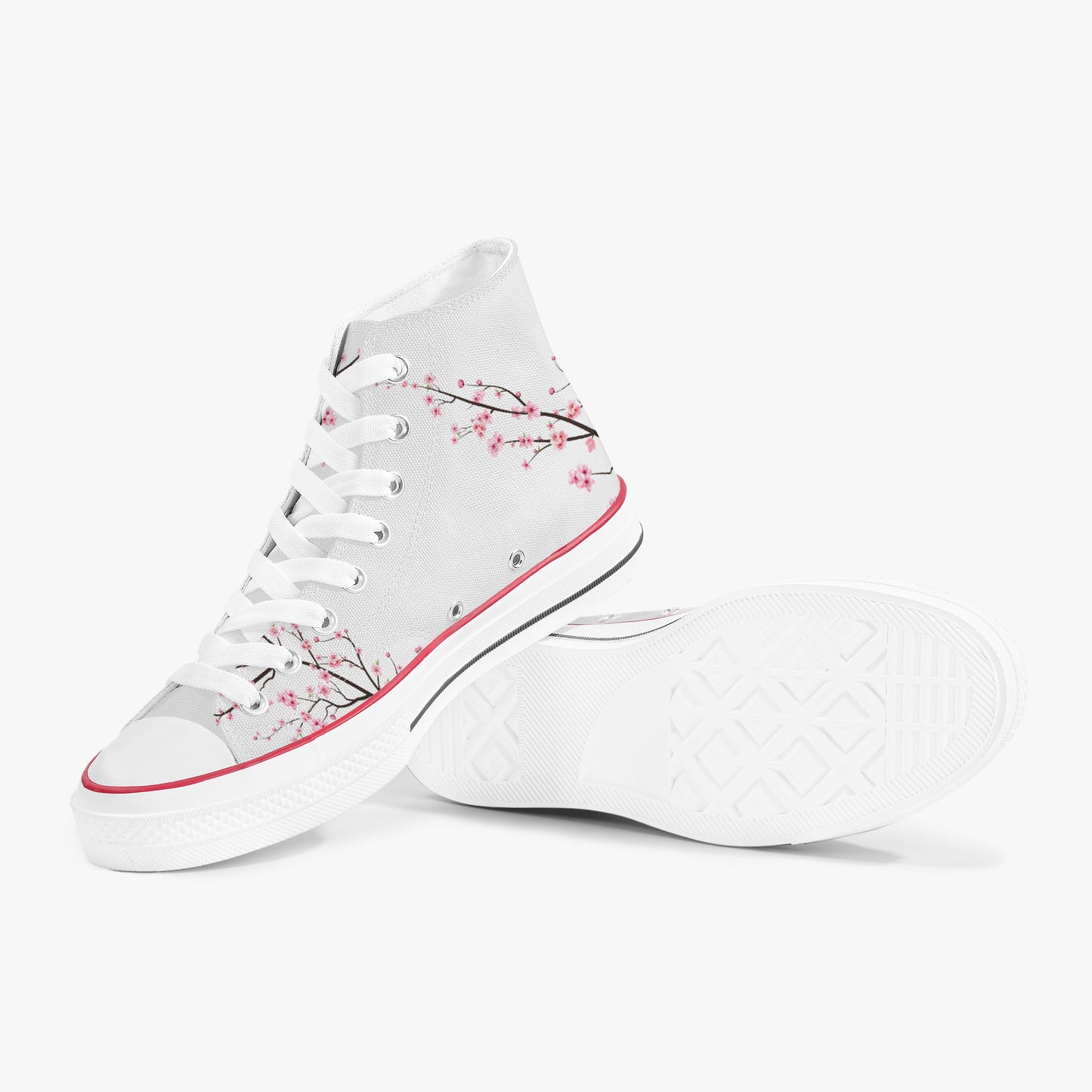 White high-top sneakers with cherry blossom design on a white background