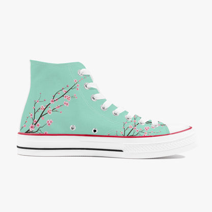 Mint green high-top sneaker with cherry blossom design on a white background
