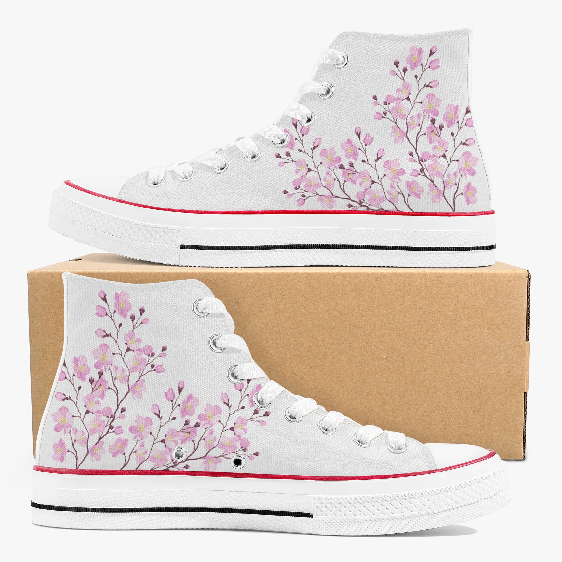 White high-top sneakers with pink floral design on a white background