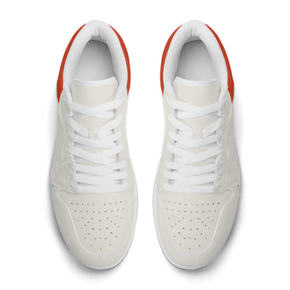 White sneakers with red accents on a white background