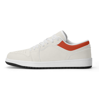 White sneaker with a red accent on a white background