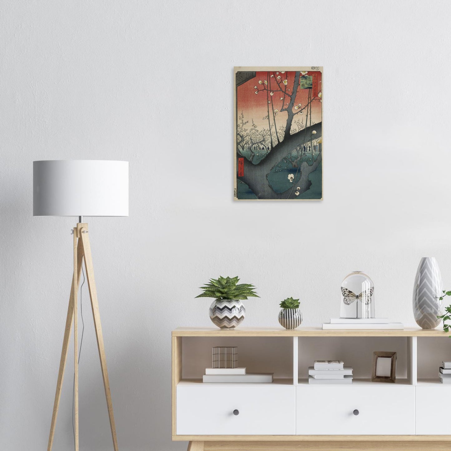 Poster of 'Just So Stories' by Rudyard Kipling on a wall above a wooden shelf with decorative items.
