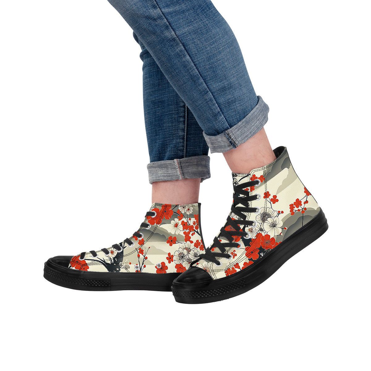 High-top sneakers with floral design worn by a person in jeans on a white background
