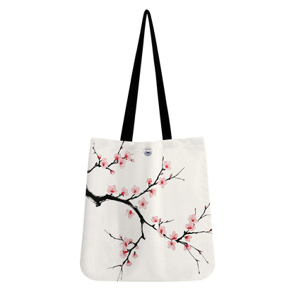 Tote bag with cherry blossom design on a white background