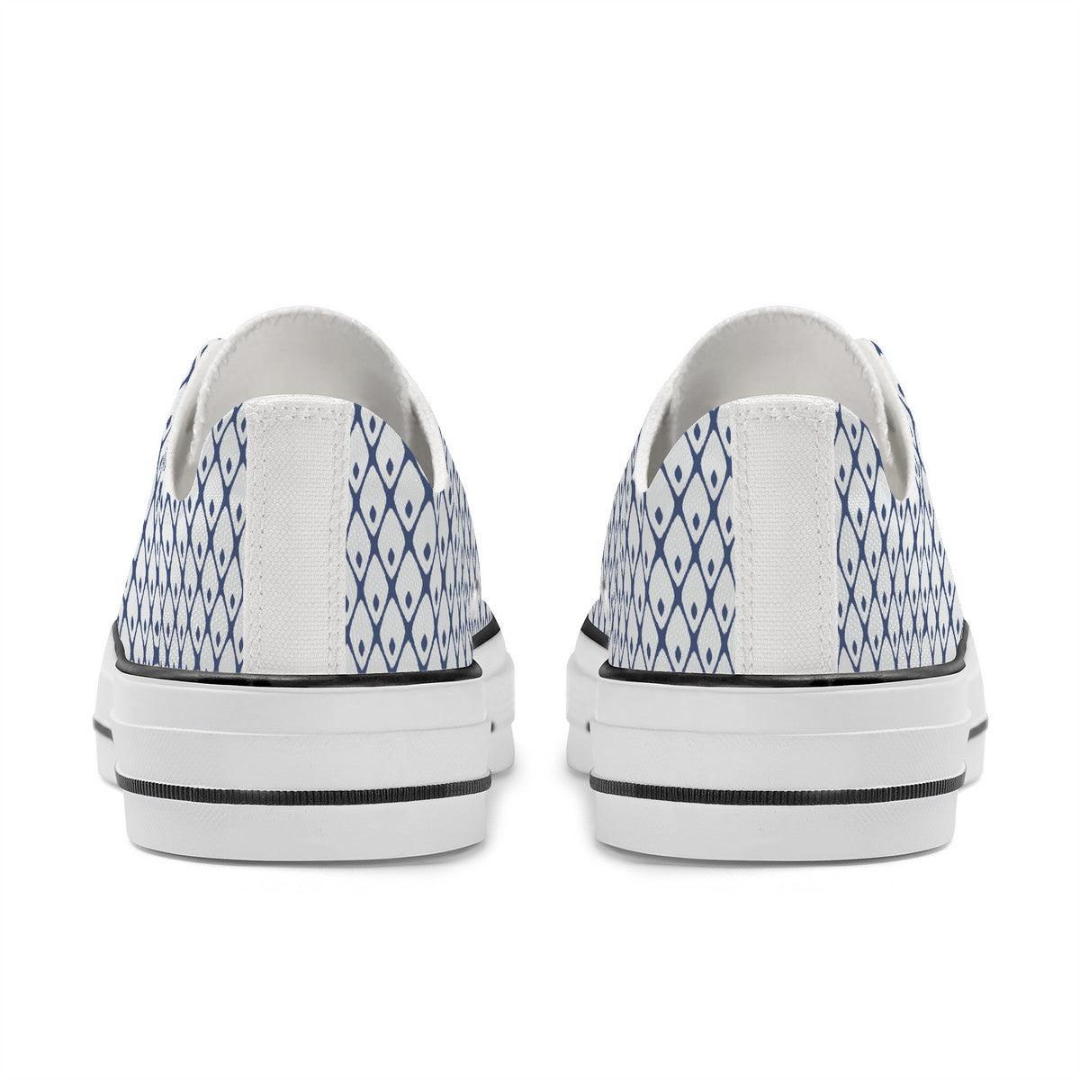 White sneakers with blue patterned soles on a white background