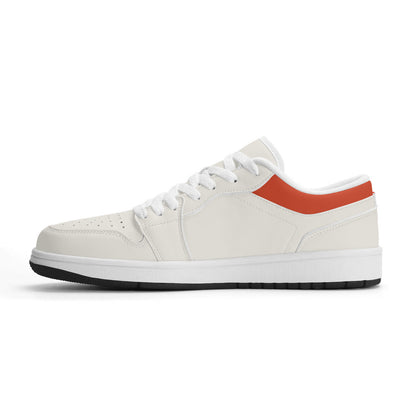 White sneaker with a red accent on a white background