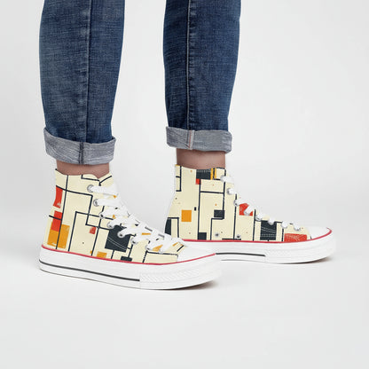 High-top sneakers with abstract pattern worn with rolled-up jeans on a white background