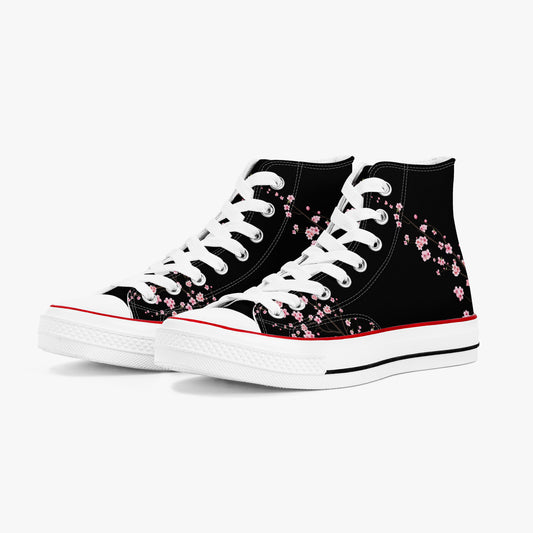 Black high-top sneakers with pink floral pattern on a white background