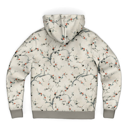 The back view of a hooded sweatshirt featuring an all-over Japanese-style plum blossom branch pattern on a cream background, with solid gray ribbed cuffs, hem, and hood.