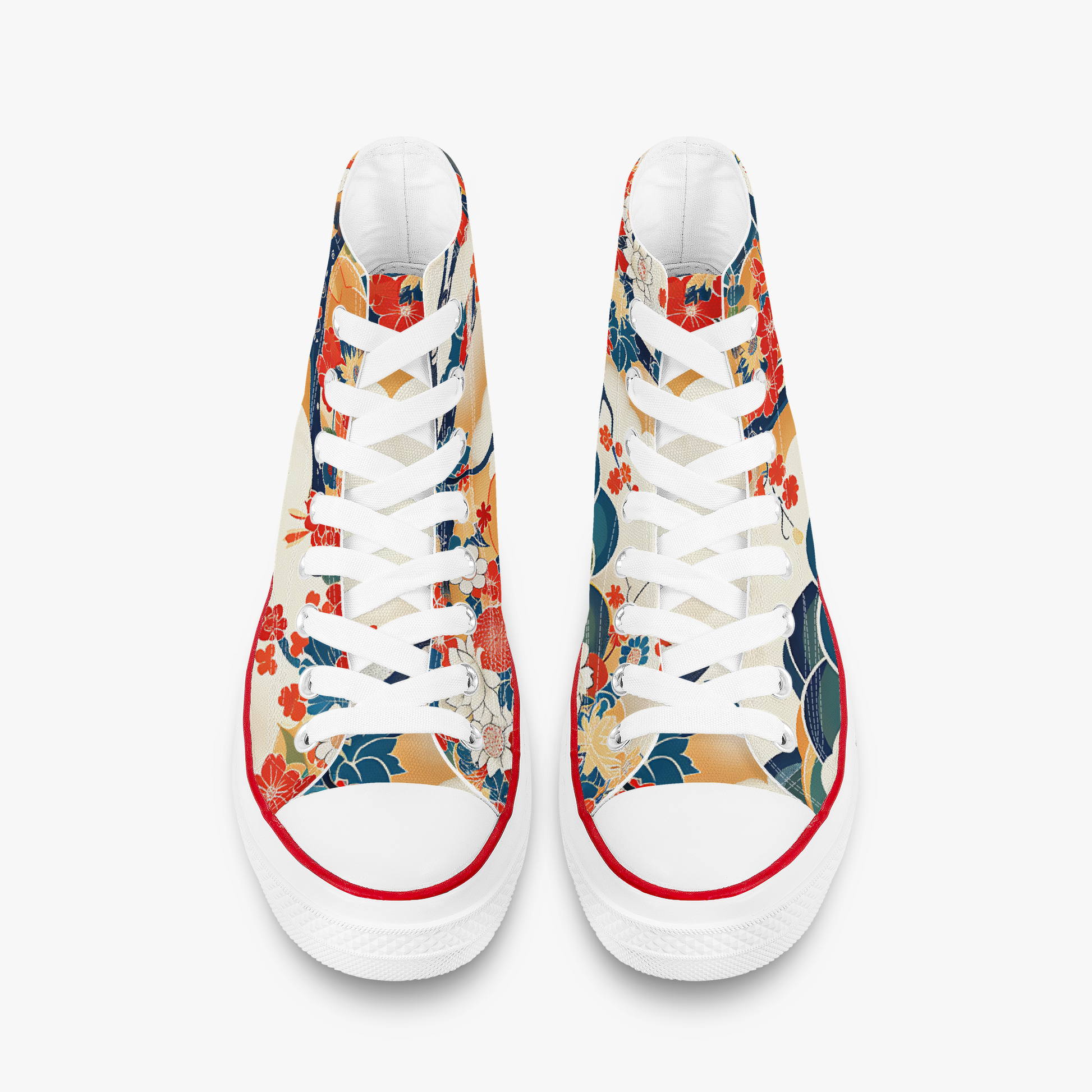Pair of white sneakers with colorful floral pattern on a white background