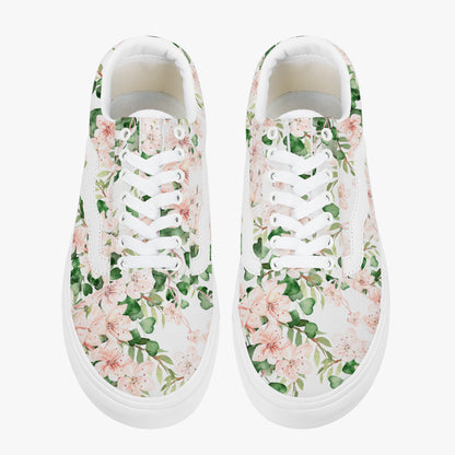 Floral patterned sneakers on a white background