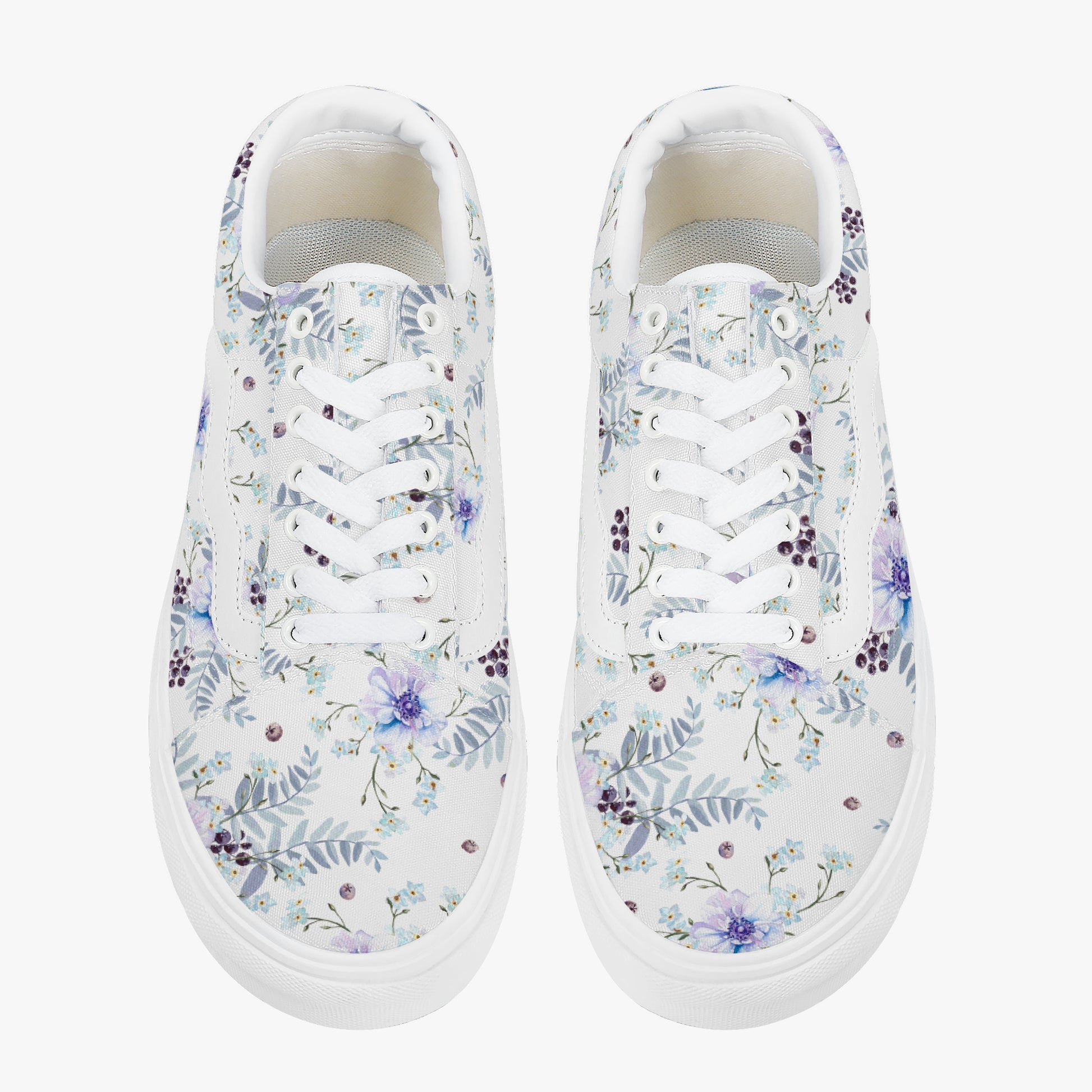 White sneakers with floral pattern on a white background