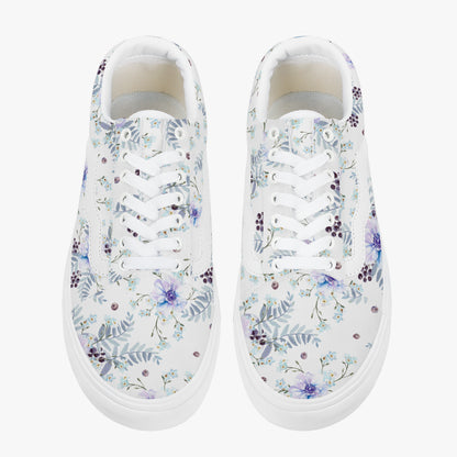 White sneakers with floral pattern on a white background