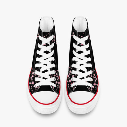 Black high-top sneakers with white laces and floral patterns on a white background
