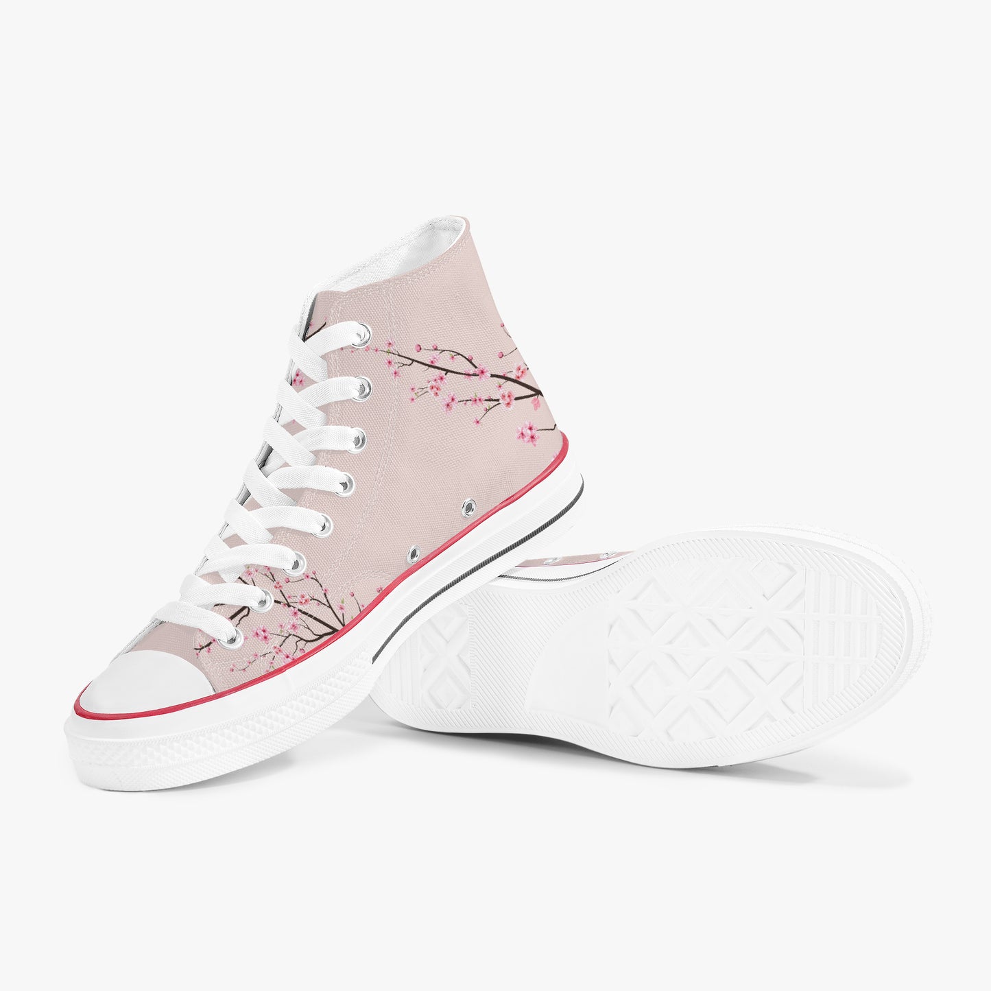 High-top sneakers with cherry blossom design on a light pink background