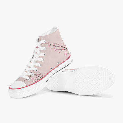 High-top sneakers with cherry blossom design on a light pink background
