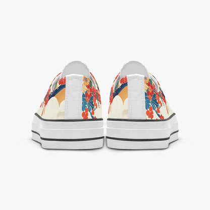 Pair of sneakers with floral design on a white background