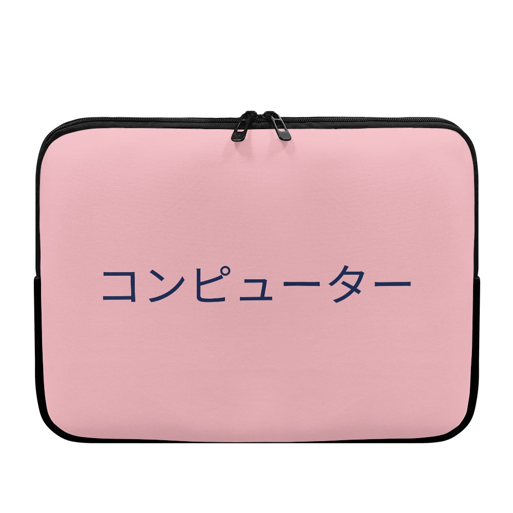Pink laptop sleeve with black text on a white background