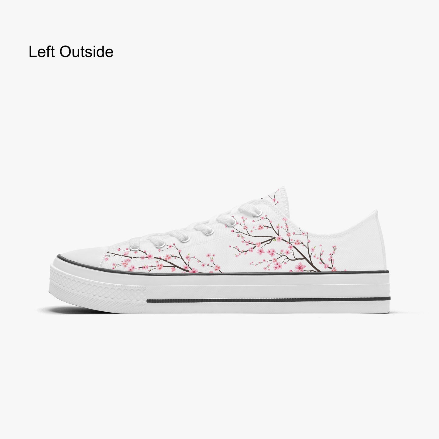 White sneaker with cherry blossom design on a white background