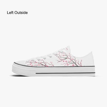 White sneaker with cherry blossom design on a white background