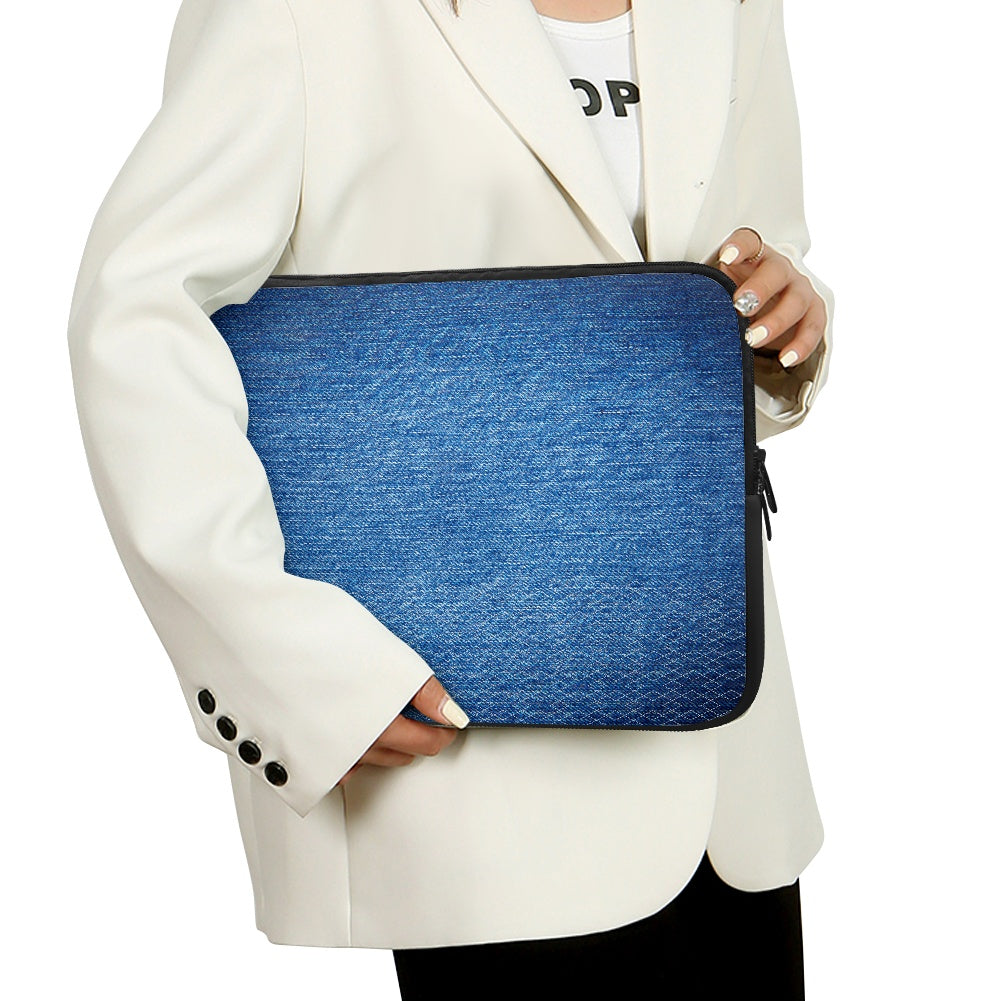 Person holding a blue laptop sleeve against a white background