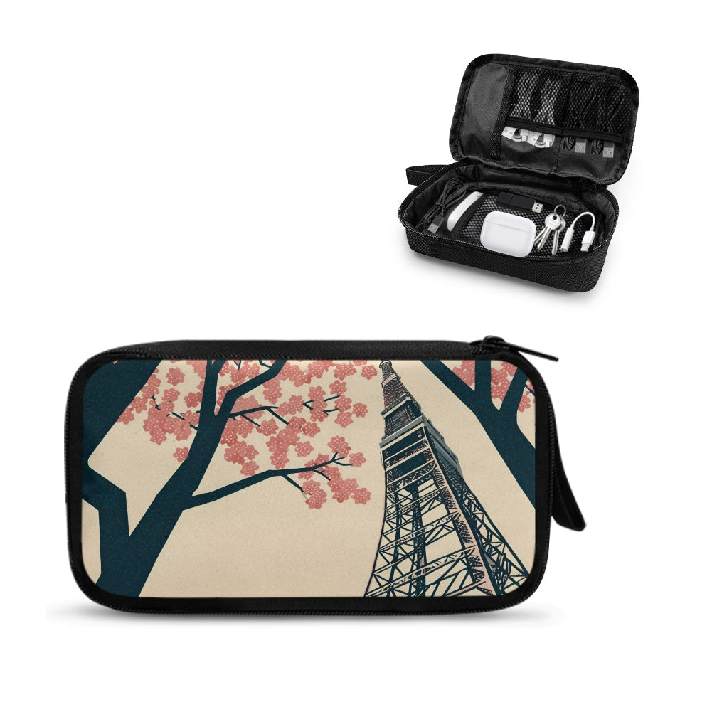 Travel case with cherry blossom design and contents on a white background