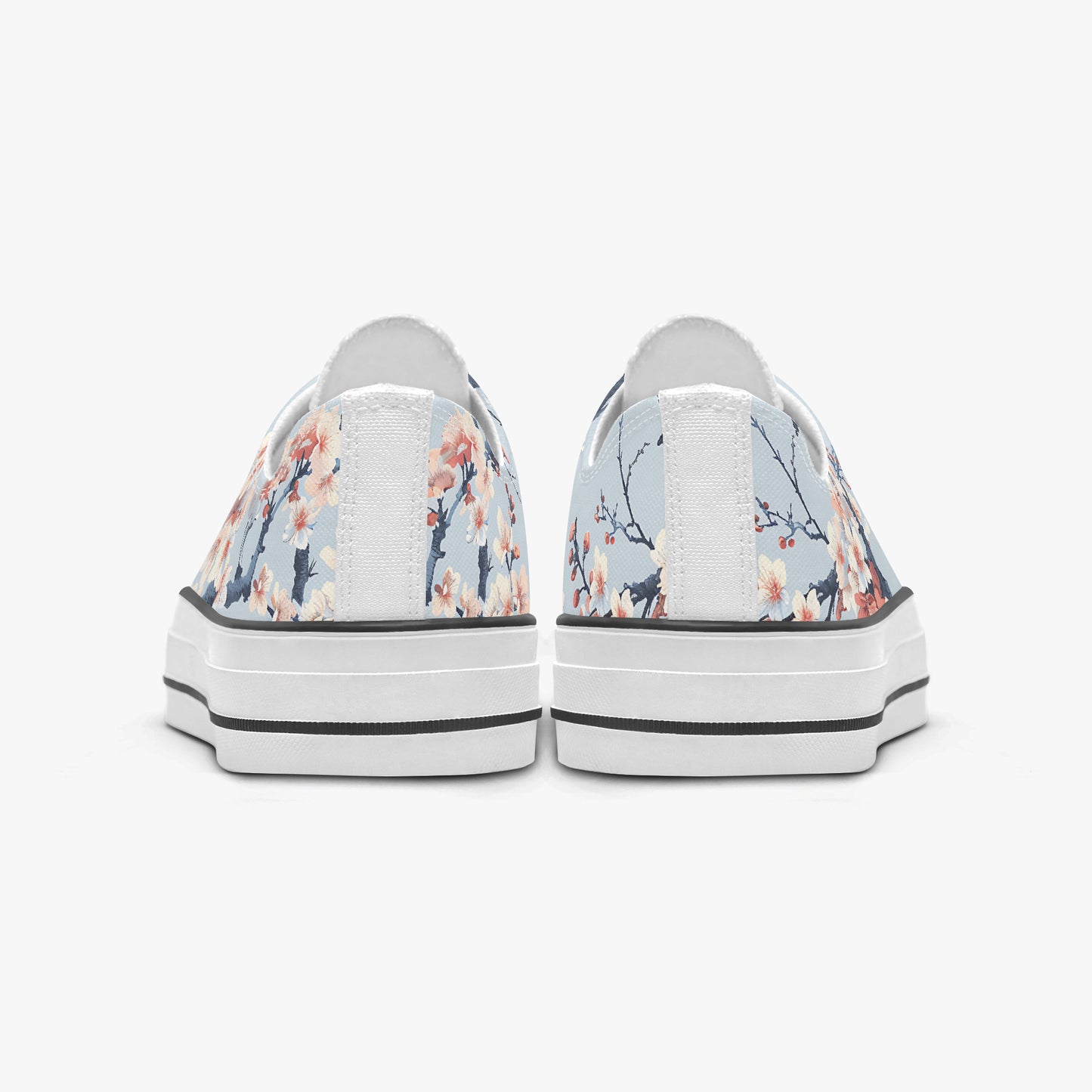 Pair of floral-patterned sneakers on a white background