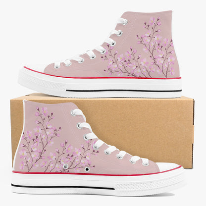 Pink high-top sneakers with floral design on a white background