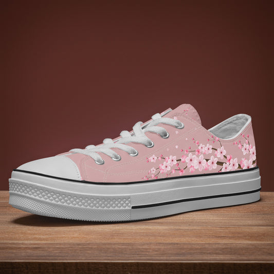 Pink sneaker with floral design on a wooden surface and brown background