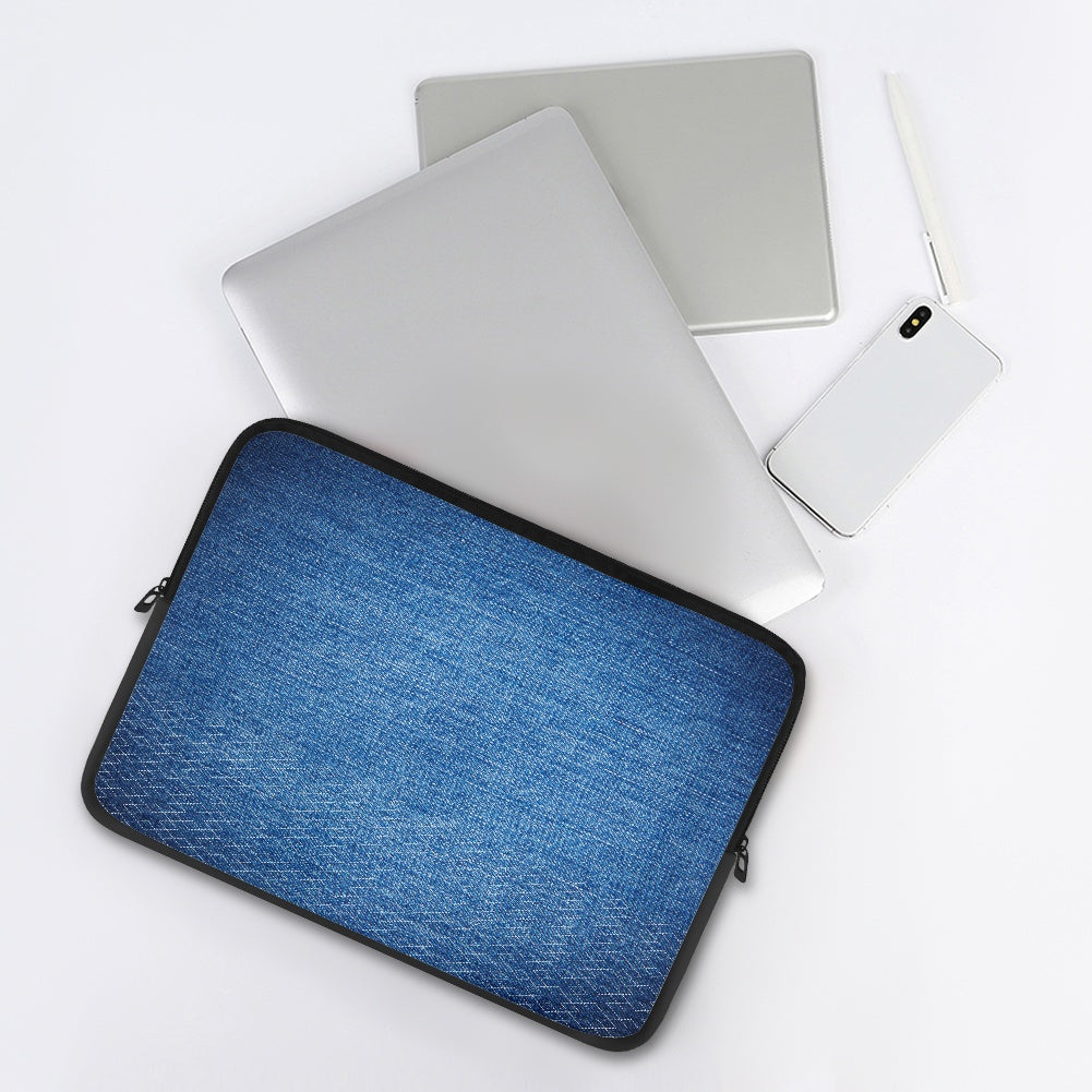 Blue laptop sleeve with a laptop, phone, and tablet on a white background