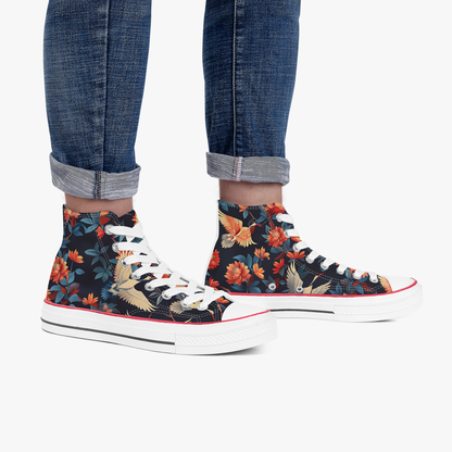 Floral patterned high-top sneakers worn with rolled-up jeans on a white background