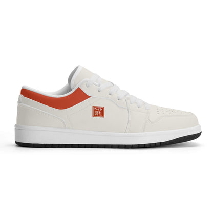 White sneaker with orange accents on a white background