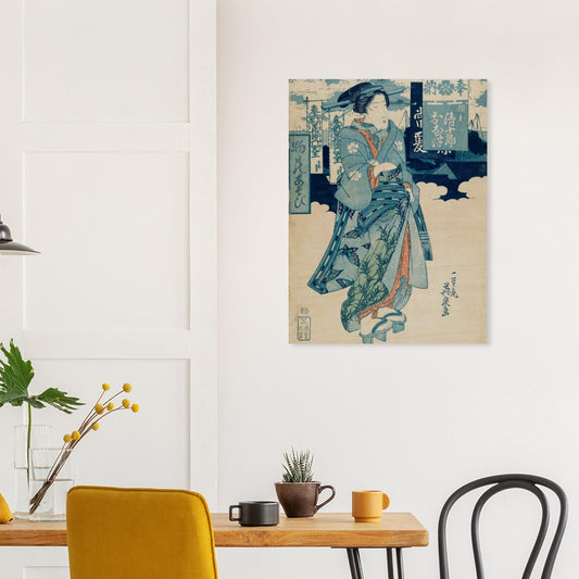 Japanese woodblock print on a wall above a dining table with chairs.