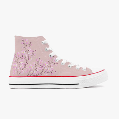 Pink high-top sneaker with floral design on a white background