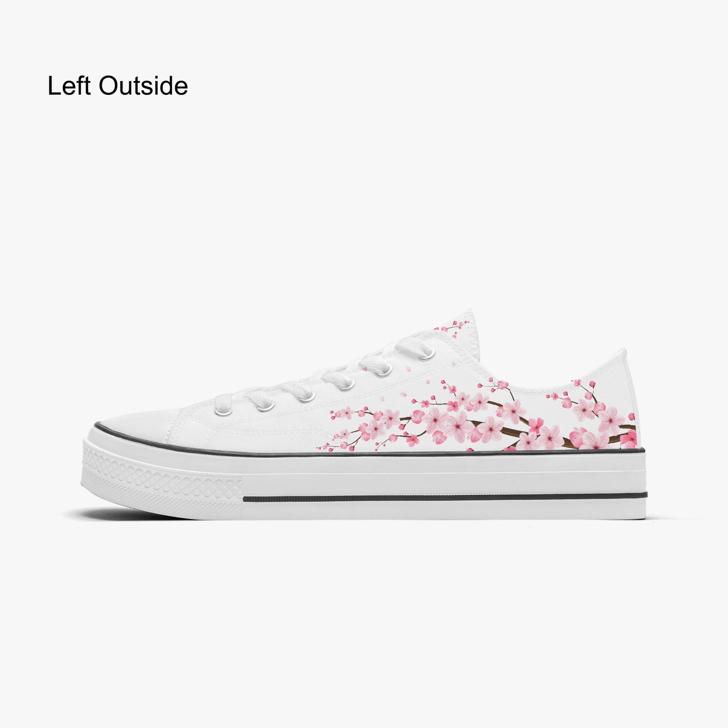 White sneaker with pink floral design on a white background