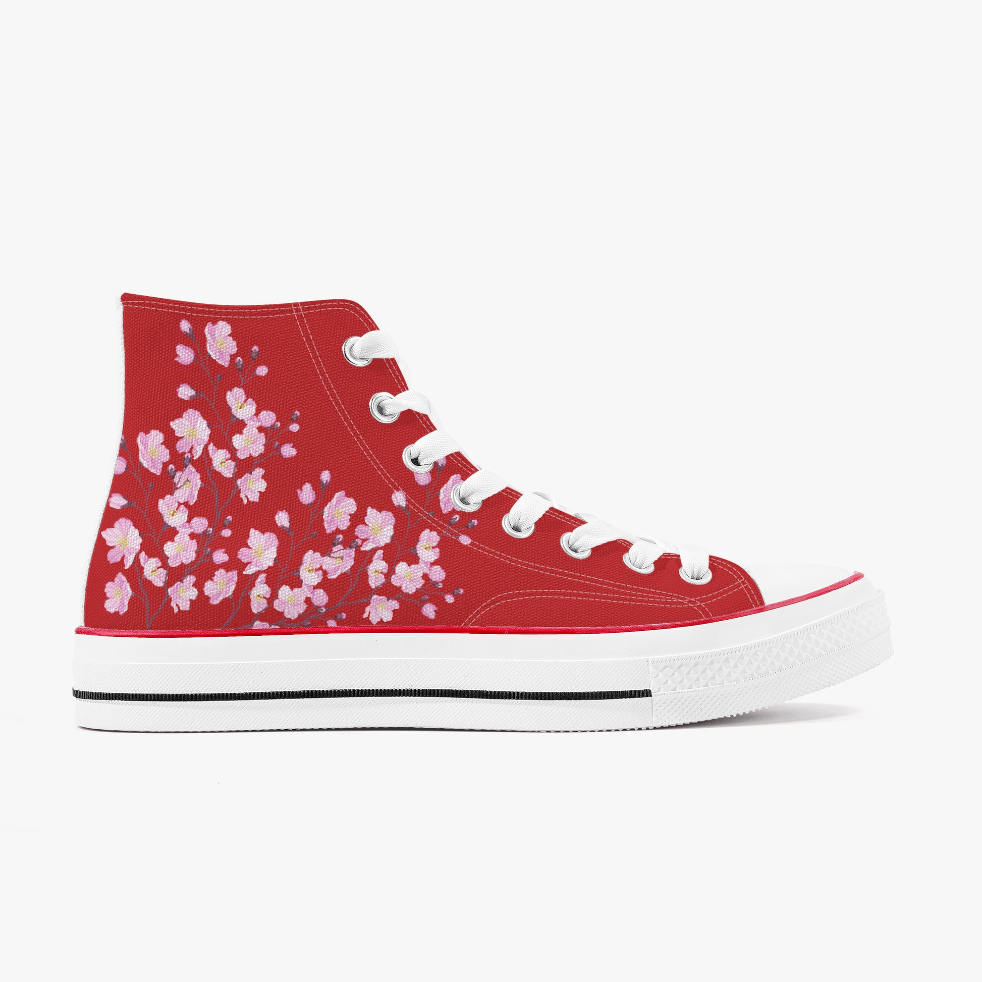 Red high-top sneaker with pink floral pattern on a white background