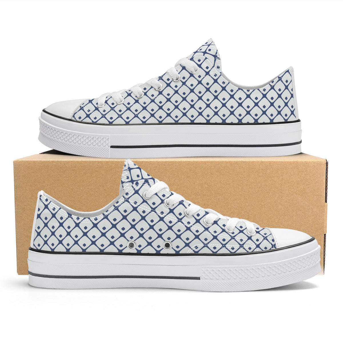 White sneakers with blue geometric pattern on a cardboard box