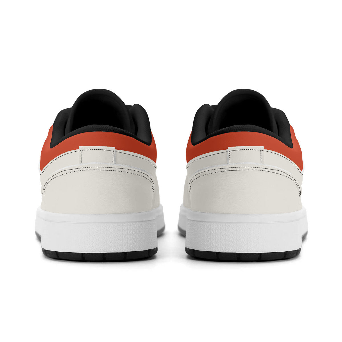 Back view of white sneakers with black and red accents on a white background