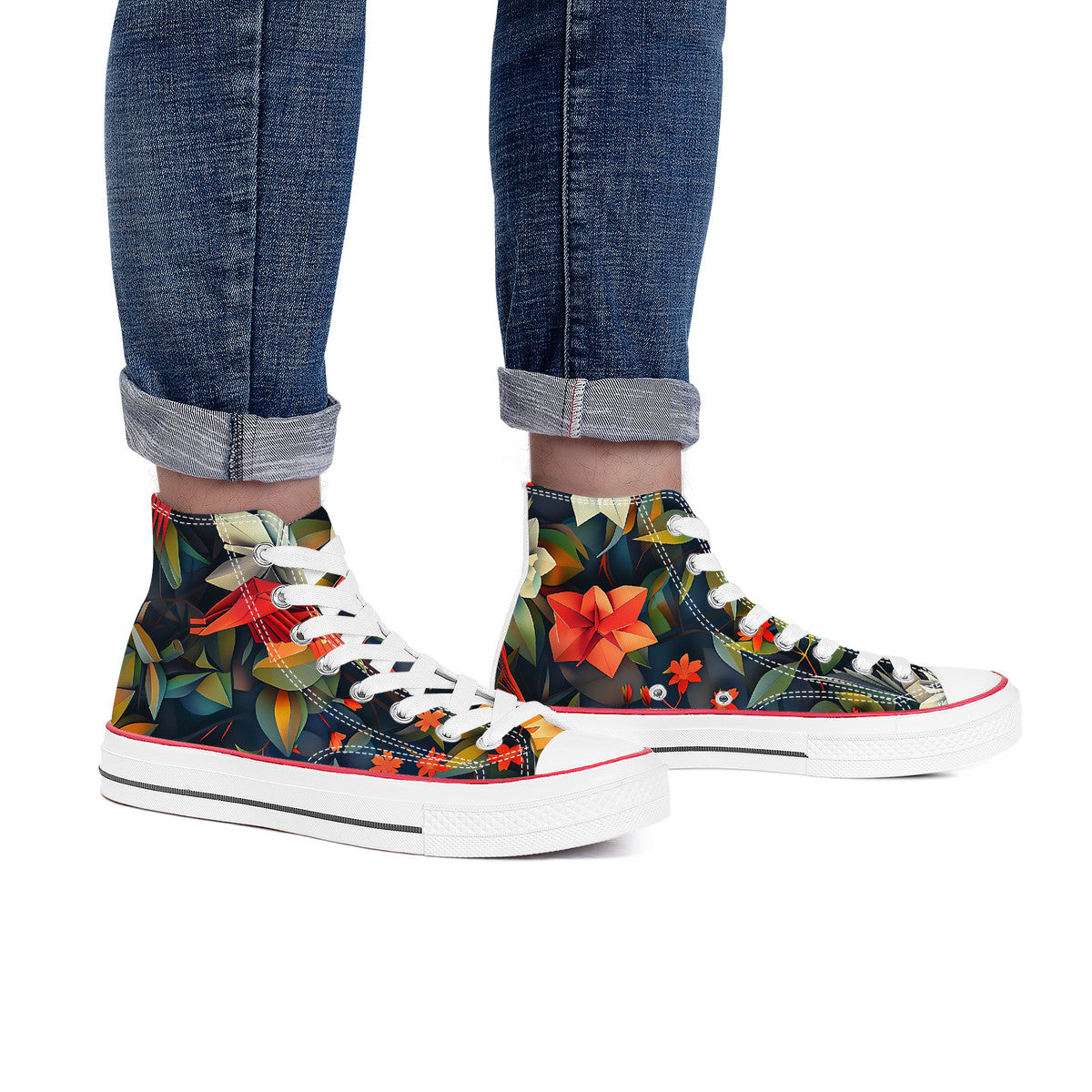Floral patterned high-top sneakers worn with rolled-up jeans on a white background